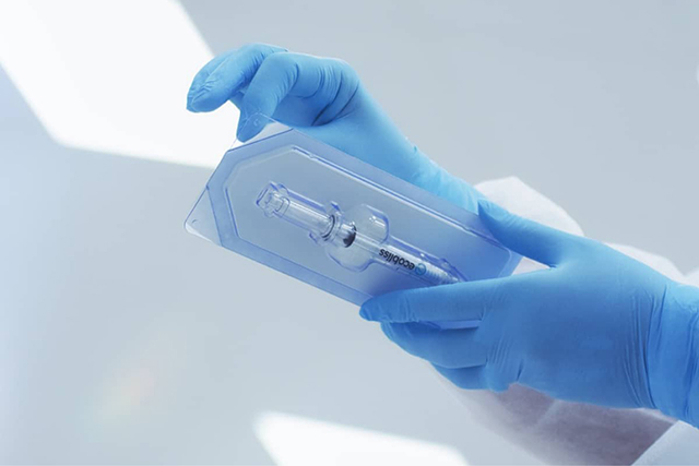 Sterile medical syringe packaging handled in clinical conditions by Ecobliss India.